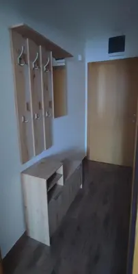 a room with wooden cabinets and a wooden floor at Soko City Center & Parking Free in Soko Banja