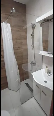 a bathroom with a shower and a sink at Soko City Center & Parking Free in Soko Banja