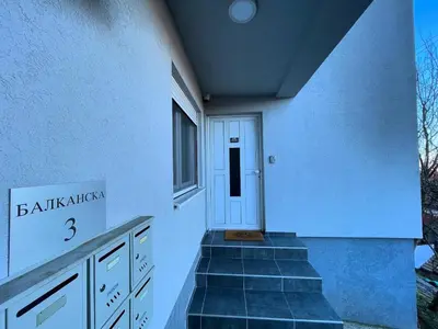 a stairway leading to a door in a building at Apartman La Vista Sokobanja in Soko Banja