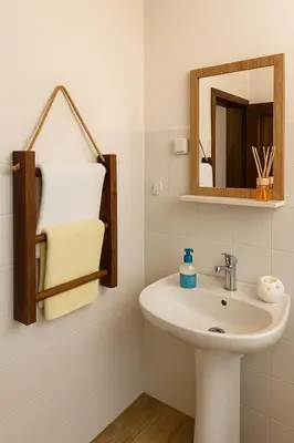 a bathroom with a sink and a mirror at Kuća iz zavičaja in Kuršumlija