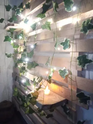 a wall with a bunch of plants on it at Kuća iz zavičaja in Kuršumlija
