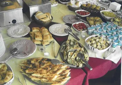 a table with many different types of food on it at UTR Jagnjilo 1986 in Raška