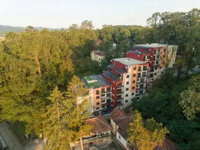 an aerial view of a city with red buildings at Woody apartman in Vrnjačka Banja