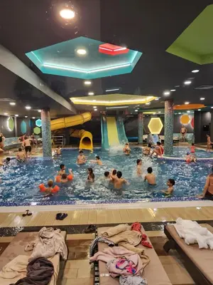 a group of people in a swimming pool at Ebra 76 Kraljevi Cardaci Kopaonik in Kopaonik