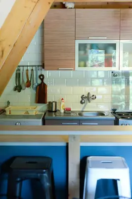 a kitchen with a sink and a counter top at Cabin & Apartment Kopaonik in Kopaonik