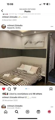 a poster for a bedroom with a bed in a room at Milmari I2 Studio LUX Apartman in Kopaonik