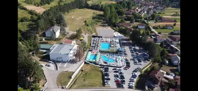 an aerial view of a parking lot with a pool at Vile Jana in Leskovac