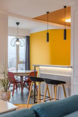 a living room with a table and chairs at Apartman Nika in Pirot