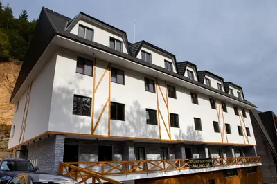 an exterior view of a building under construction at Ramonda apartman Vila Bela Reka 50m from Gondola - free parking acces in Brzeće