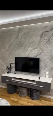 a flat screen tv sitting on top of a table at Magic Apartments Sokobanja in Soko Banja