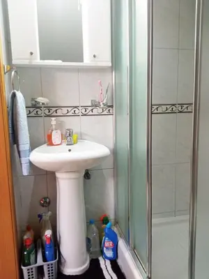 a bathroom with a sink and a shower at Apartman Babić in Vrnjačka Banja