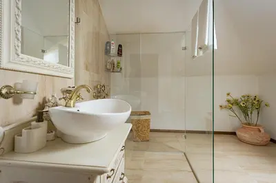 a bathroom with a sink and a glass shower at Eko Zaseok Brana in Rekovac