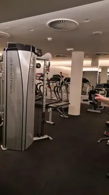 a gym with several treadmills and machines at DolceVita Lux & SPA in Vrnjačka Banja