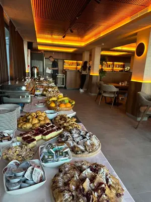 a buffet line with many different types of food at Tontic Lux Milmari in Kopaonik