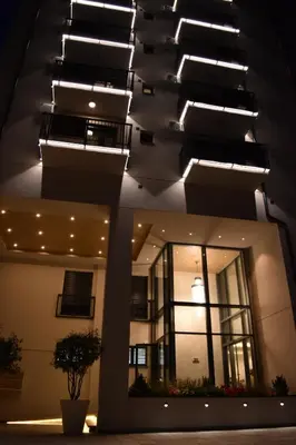 a building with a bunch of lights on the ceiling at Lux Apartman Crnjanski IV, Jagodina in Jagodina