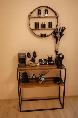 a table with a mirror on a wall with a shelf at Stan na dan Premium 030 in Bor