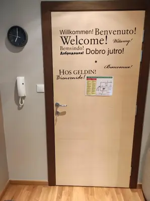 a door with writing on it in a room at Gondola Studio Brzeće Kopaonik in Brzeće