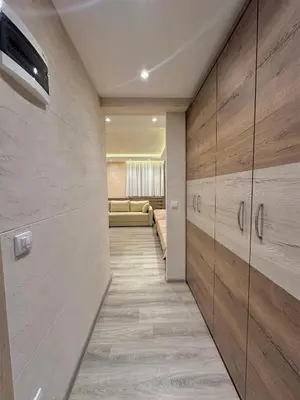a hallway with a couch in a room at MB Apartmani Kopaonik in Kopaonik