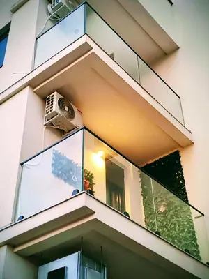 a window of a house with a air conditioner on it at APARTMAN ANDREA in Leskovac