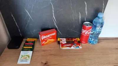 a group of food and drinks on a table at Apartman MK Kopaonik in Kopaonik