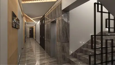 a hallway with a staircase in a building at Lukić Apartmani in Kopaonik