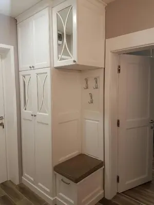 a white closet with white cabinets and a drawer at Apartman Maglic 412 Lux in Kopaonik