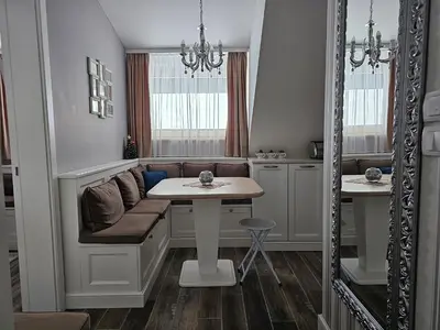 a living room with a couch and a table at Apartman Maglic 412 Lux in Kopaonik