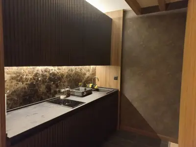 a kitchen with a sink and a counter top at Woodside Kopaonik By Gogic in Kopaonik
