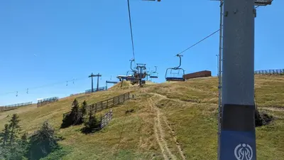a hill with a ski lift on top of it at Studio Čuvarkuća in Kopaonik