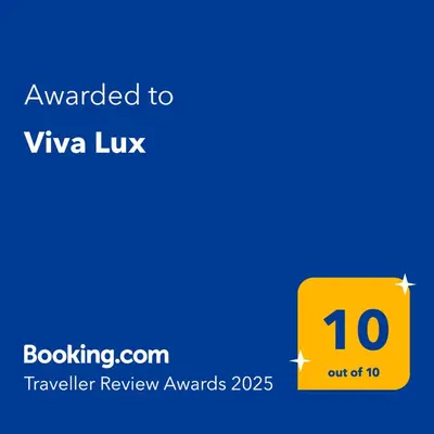 a yellow box with the text awarded to viva lux at Viva Lux in Soko Banja
