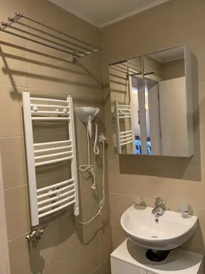 a bathroom with a sink and a mirror at Apartment Župa 111 - Župa, Kopaonik in Kopaonik
