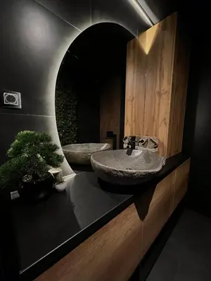 a bathroom with a sink and a mirror at Beta Lux in Zaječar