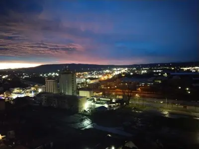 a view of a city at night at Studio apartman Nataly in Kruševac