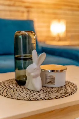 a figurine of a bunny sitting on a table at Viktorija chalet in Kopaonik