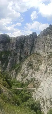 a view of a mountain with a train on it at Apartman Nissa in Niš