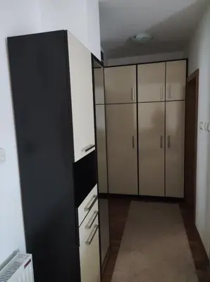 a room with a closet and cabinets in it at NENADOVO in Soko Banja