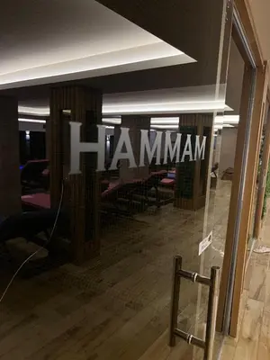 a glass door with the word amazon written on it at Milmari Apartman Lucky L03 in Kopaonik