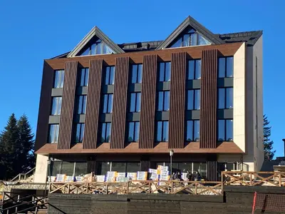 a large building with windows on the side of it at Stefany in Kopaonik