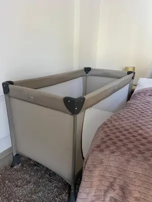 a close up of a bed in a bedroom at Milmari N lux Sena in Kopaonik