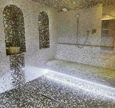 a bathroom with a shower and a tub and a sink at Studio M in Kopaonik