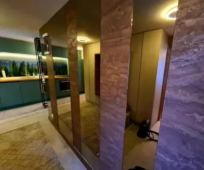 a reflection of a mirror in a room at Drop Kop in Brzeće