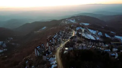 an aerial view of a road on a mountain at King apartments Kopaonik in Kopaonik