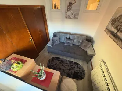 an overhead view of a living room with a couch at Apartman Slavica in Vrnjačka Banja