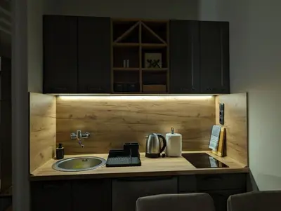 a kitchen with a sink and a counter top at BratSki Apartman - 200m od gondole in Brzeće