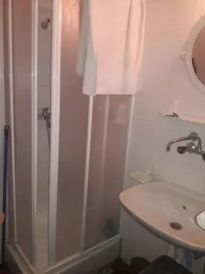 a bathroom with a shower and a sink at Apartman Ema,Bela Reka,Brzece in Brzeće