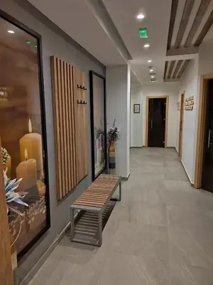 a hallway with a bench in a building at President Kop Paxson in Kopaonik