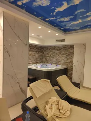 a spa room with a jacuzzi tub at President Kop Paxson in Kopaonik