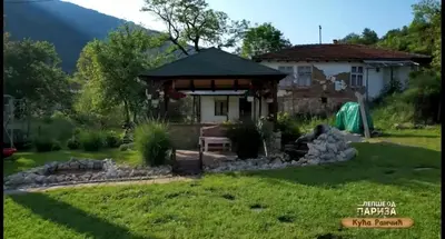 a house with a gazebo in a yard at Kuca Rancic in Pirot