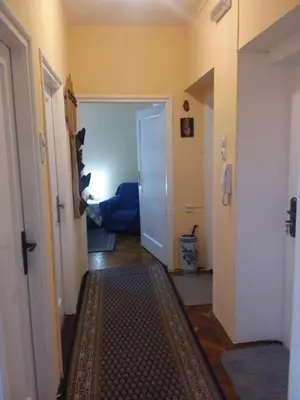 a hallway with a door leading into a room at Ikaria in Niš