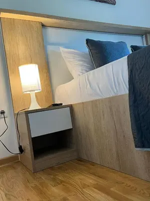 a bunk bed with a tv in a room at Apartman Gorsky in Vrnjačka Banja